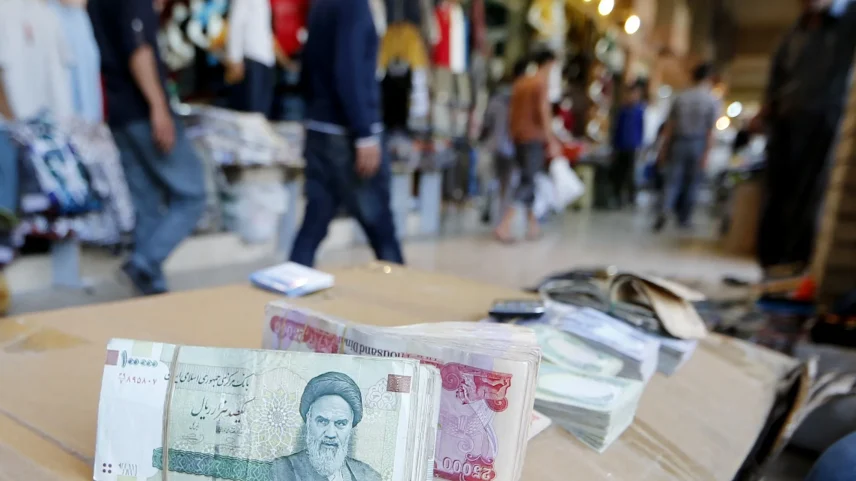 Iranian rial banknotes bearing a portrait of the late founder of the Islamic Republic of Iran, Ayatollah Ruhollah Khomeini.