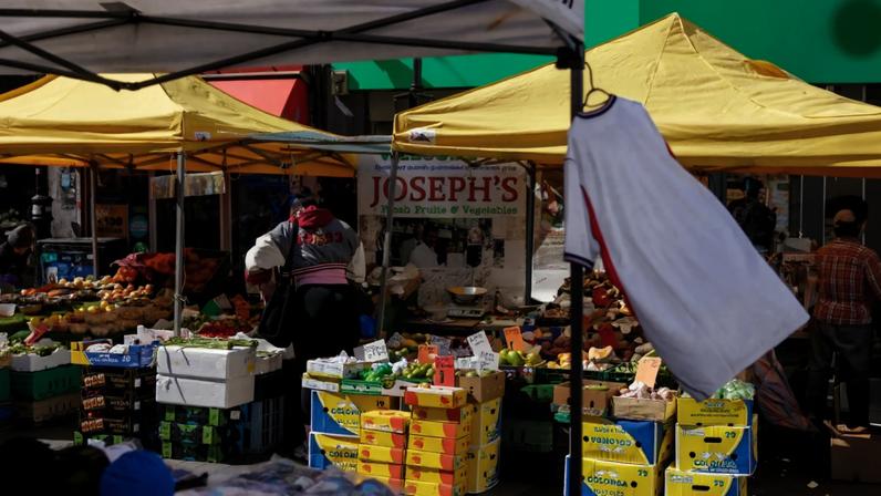 Shoppers at Surrey Street market in Croydon, UK.
