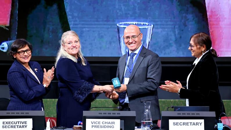 INC Vice Chair Johanna Lissinger-Peitz, Sweden, passes the gavel to new INC Chair Julio Cordano, Chile, in February 2026.