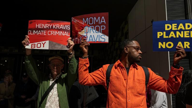 Protestors at MoMA in 2023 protesting the patronage of Henry and Marie-Josée Kravis.