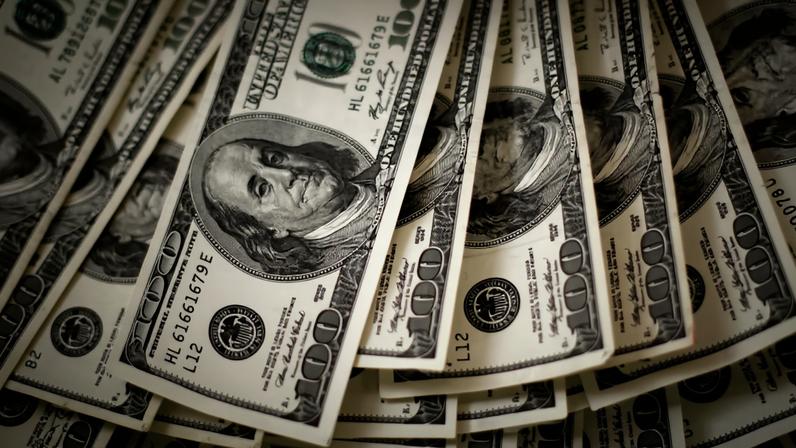 Notas de dólar. — Foto: Rick Wilking/Reuters