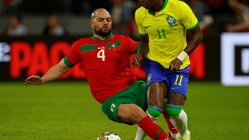 FILE PHOTO: Soccer Football - International Friendly - Morocco v Brazil - Grand Stade de Tanger, Tangier, Morocco - March 25, 2023 Morocco's Sofyan Amrabat fouls Brazil's Vinicius Junior REUTERS/Juan Medina/File Photo