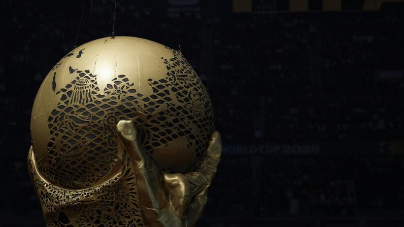 General view of a replica World Cup trophy during the opening ceremony before the match