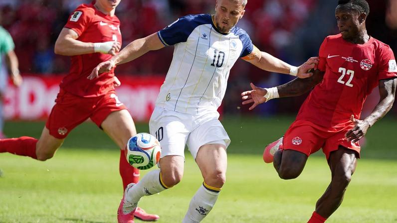 Bosnia and Herzegovina's Ermedin Demirovic in action with Canada's Richie Laryea and Alistair Johnston IMAGN IMAGES via Reuters/John Sokolowski