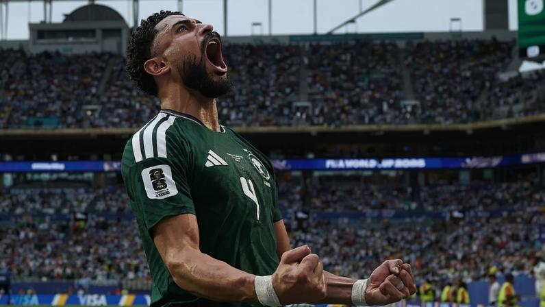 Al Amri celebrates scoring Saudi's goal at the Hard Rock Stadium