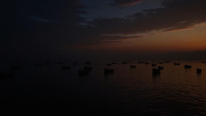 FILE PHOTO: A drone view shows vessels in the Strait of Hormuz, as seen from Musandam, Oman, June 15, 2026. REUTERS/Stringer/File Photo