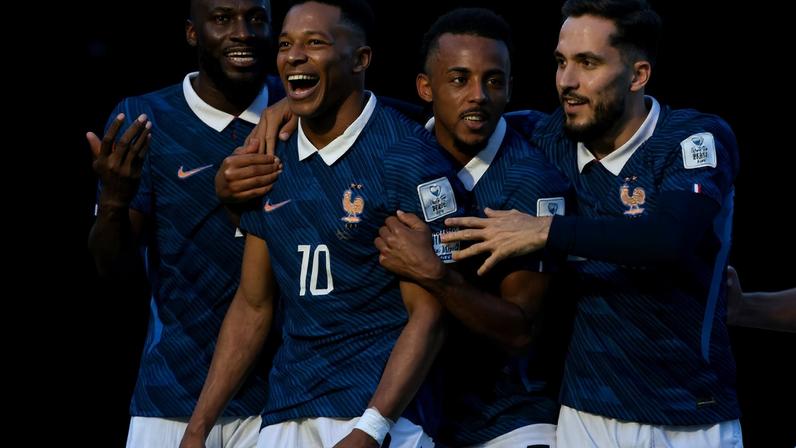 France's Kylian Mbappe celebrates scoring their third goal with Dayot Upamecano, Jules Kounde and Rayan Cherki