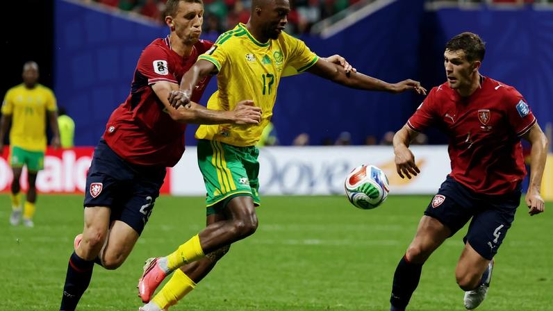 South Africa's Evidence Makgopa in action with Czech Republic's Tomas Soucek and Robin Hranac