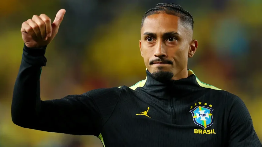 Brazil's Raphinha acknowledges fans after the match