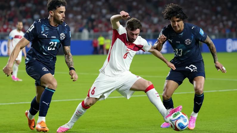 Soccer Football - FIFA World Cup 2026 - Group D - Turkey v Paraguay - San Francisco Bay Area Stadium, Santa Clara, California, U.S. - June 19, 2026 Turkey's Orkun Kokcu in action with Paraguay's Gabriel Avalos and Jose Canale IMAGN IMAGES via Reuters/Darren Yamashita