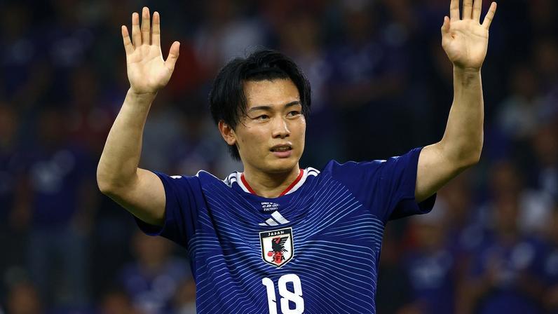 Japan's Ayase Ueda celebrates after the match
