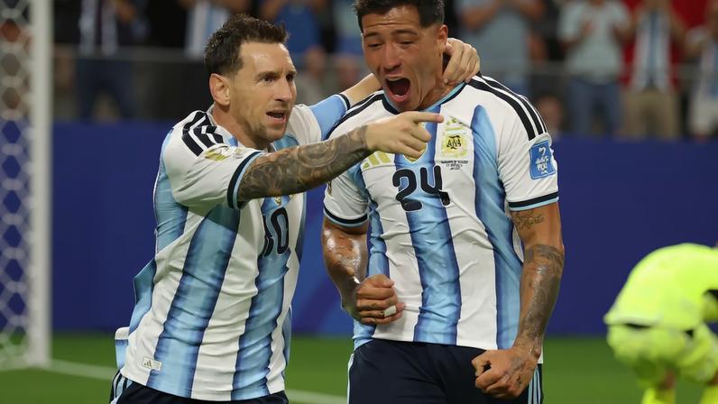Argentina's Lionel Messi celebrates scoring their first goal with Enzo Fernandez IMAGN IMAGES via Reuters/Troy Taormina