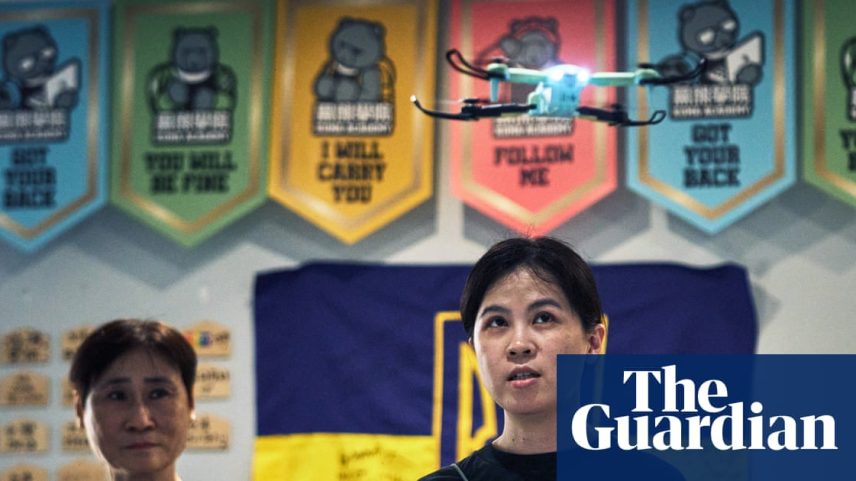 Participants flying a drone at a Kuma Academy Drone training session in Taipei.
