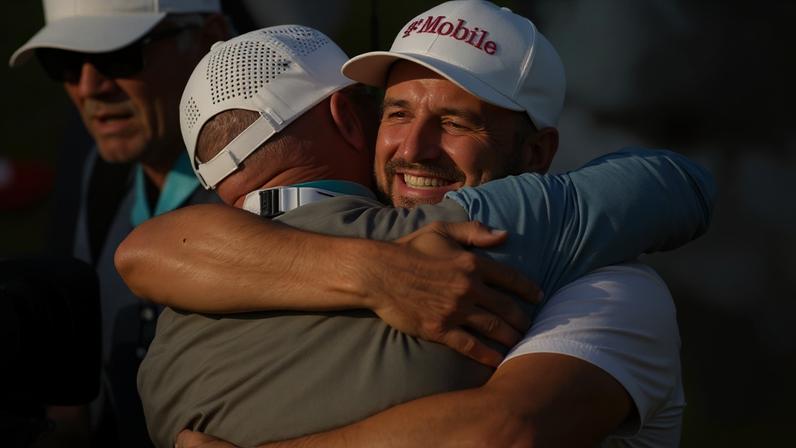 Wyndham Clark embraces his father Randall after winning the US Open at Shinnecock Hills.