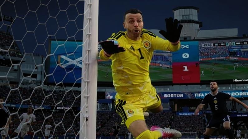 Angus Gunn of Scotland leaps in an attempt to make a save during the World Cup defeat against Morocco.