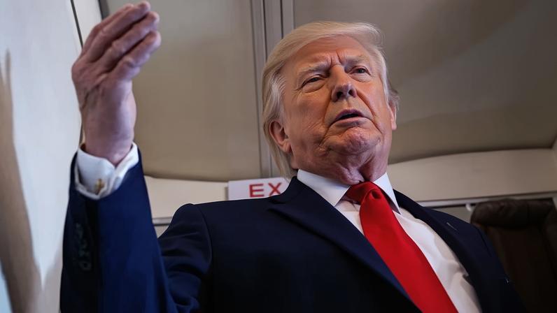 Donald Trump speaks to reporters aboard Air Force One on 5 June