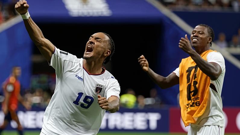 Dailon Livramento, left, and Sidny Lopes Cabral celebrate after Cape Verde held Spain to a goalless draw.
