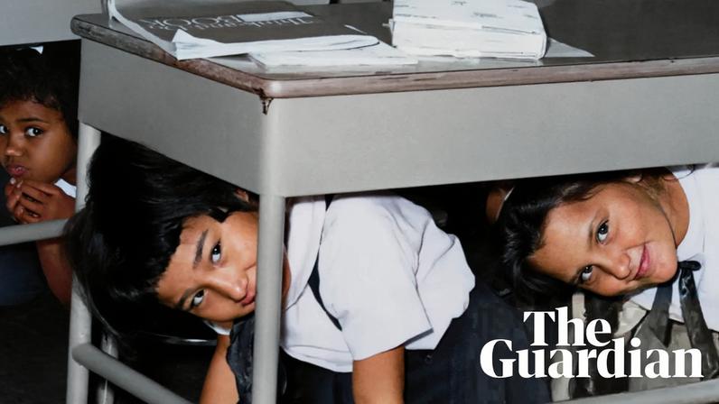 Duck and cover … schoolchildren practise a drill during the Cuban missile crisis.
