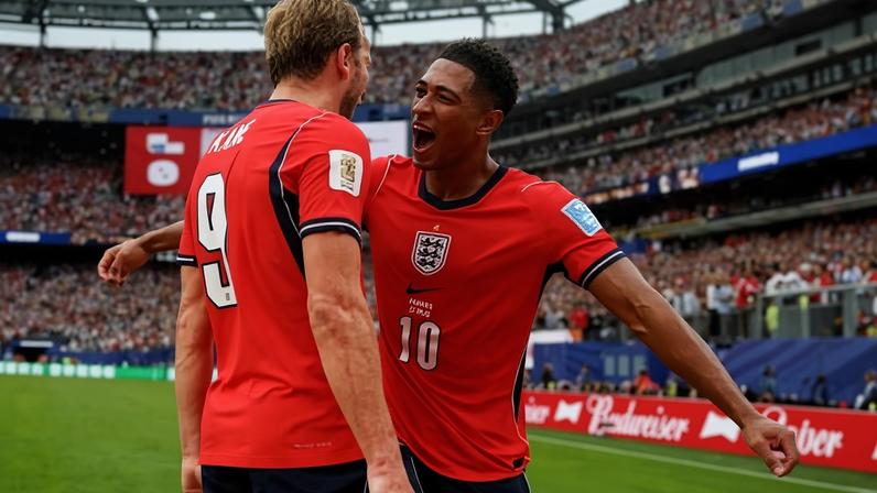 Harry Kane celebrates with Jude Bellingham, who supplied the cross for England’s second goal.
