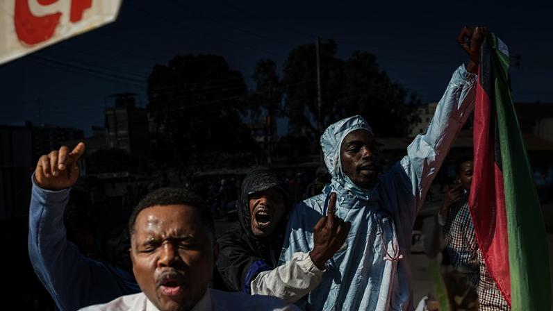 People in Nanyuki, Kenya, demonstrate against a US-built Ebola quarantine centre for Americans arriving from the Democratic Republic of the Congo.