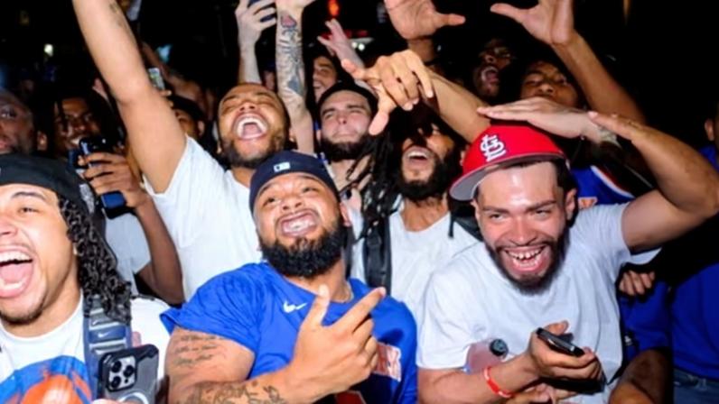 Knicks fans cheer after the team won the NBA championship to end their long wait.