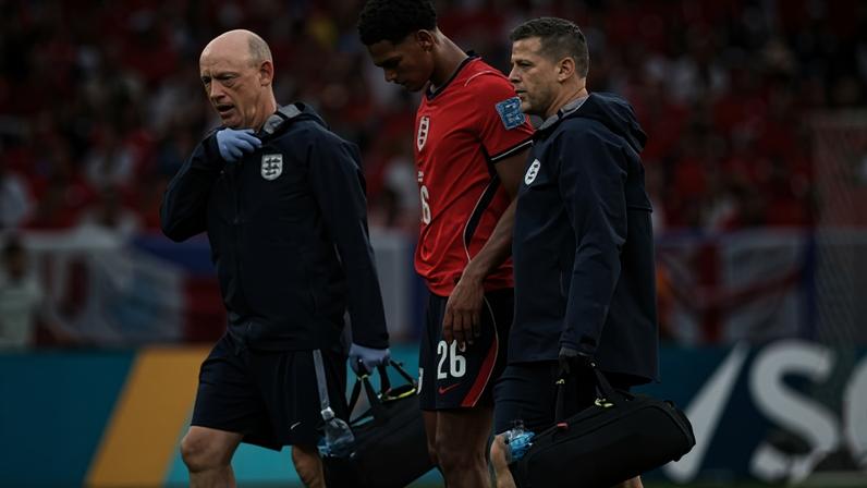 Jarell Quansah leaves the pitch with an injury during England's game against Panama