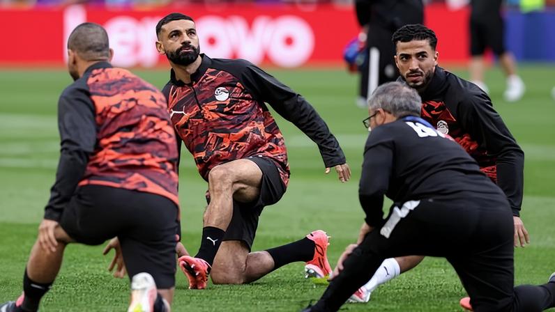 Mo Salah warms up with teammates ahead of kick-off between Egypt and Iran in Seattle. Follow live updates and scores from the EGY vs IRN Fifa World Cup 2026 Group G match.