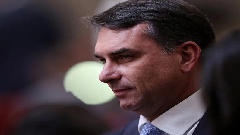 FILE PHOTO: Senator Flavio Bolsonaro arrives for the inauguration ceremony of Kassio Nunes as the new president of the Superior Electoral Court in Brasilia, Brazil, May 12, 2026.REUTERS/Adriano Machado/File Photo