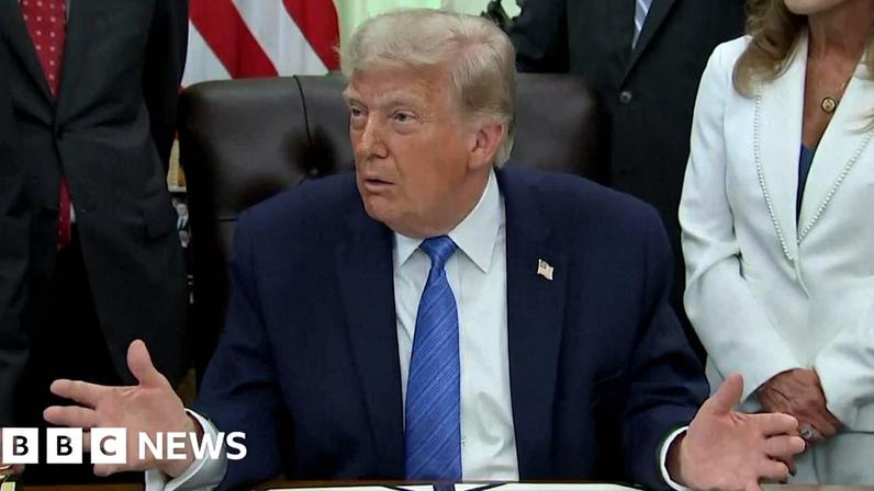 Trump at his Oval Office desk
