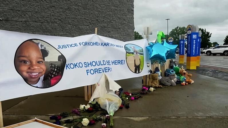 A memorial to Kohen Wiley is seen outside the Walmart in Senatobia, Mississippi, on 18 June.