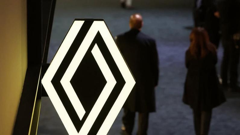 a sign with a renault logo shaped design