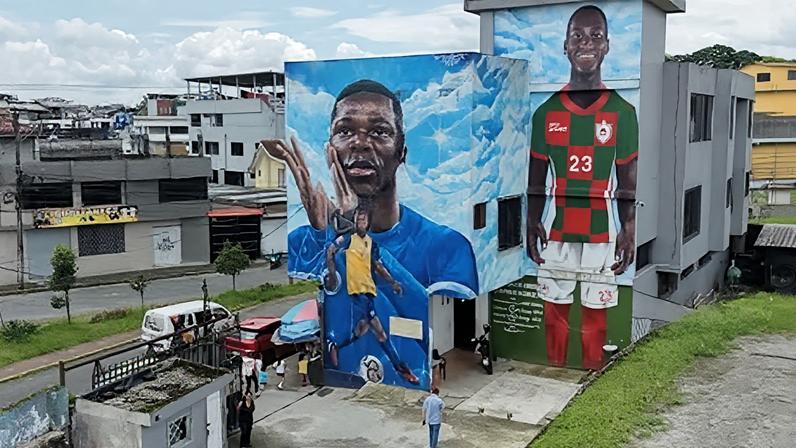 Moisés Caicedo’s status in Ecuador is shown by a mural in Santo Domingo. ‘We can’t settle for just qualifying,’ he said. Photograph: Rodrigo Buendía/AFP/Getty Images
