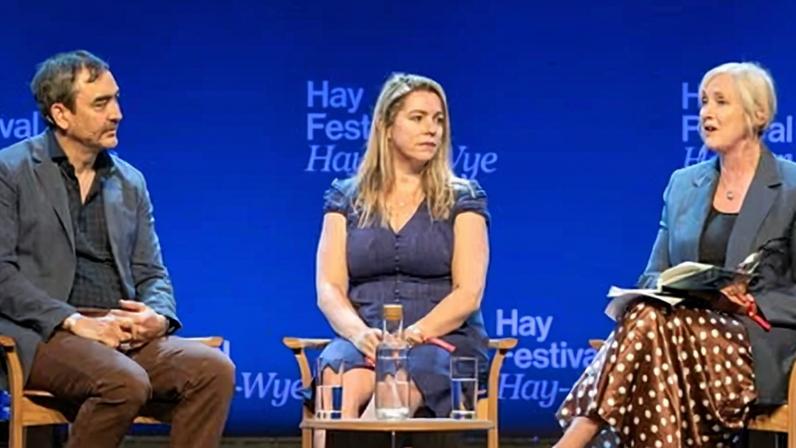 Wynn-Williams (centre) spent the scheduled hour sitting in front of the audience without speaking. She was also unable to nod or shake her head.