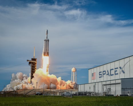 A SpaceX Falcon Heavy rocket lifting off from Launch Complex 39A at NASA's Kennedy Space Center, Florida.