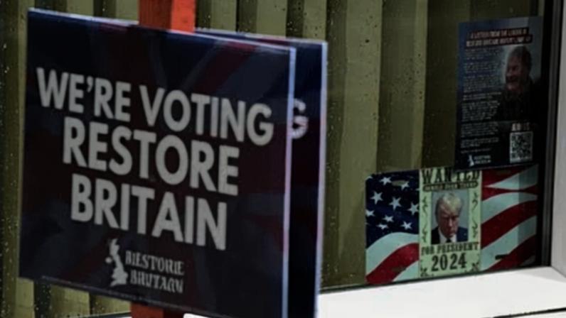A Restore Britain placard outside a house in Ashton-in-Makerfield, 9 June 2026.