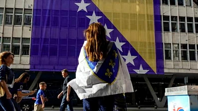 The official flag (above) represents tenacious hope and deep disappointment.