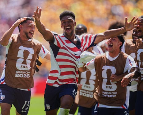 The USA players charge off in celebration as the Seattle Stadium erupts in joy after Alex Freeman’s goal against Australia was given after a VAR review.