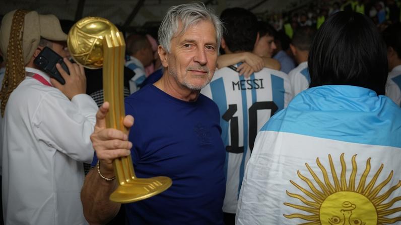 Jorge Messi, Lionel’s father, holding his son's trophy for being the best player at the last World Cup after Argentina’s win against France in the 2022 final.