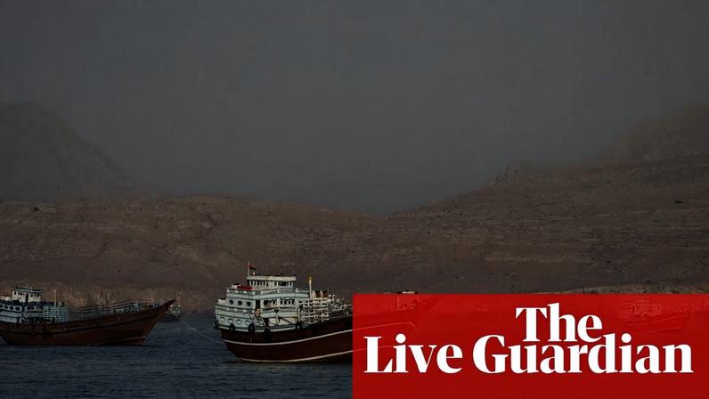Vessels at the strait of Hormuz, as seen from Musandam, Oman, 14 June, 2026, a day before the US and Iran reached an initial peace deal. Follow for live updates on the latest developments in the Iran war and Middle East crisis