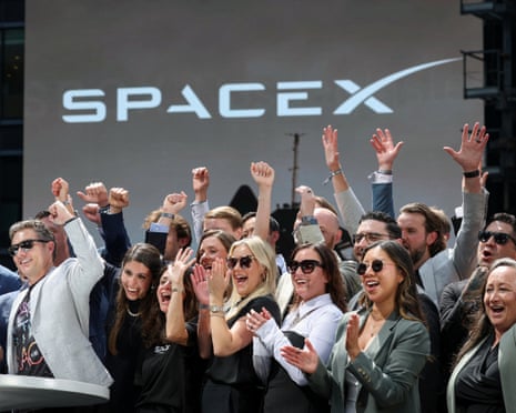 SpaceX staff and guests celebrate the company’s IPO in New York on Friday.