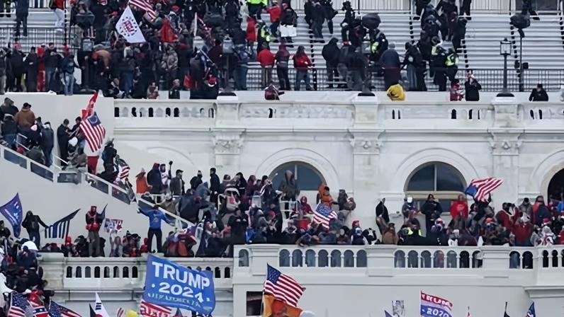 Pro-Trump protesters occupy the US Capitol, including the inaugural stage and viewing stands, in Washington DC, on 6 January 2021.