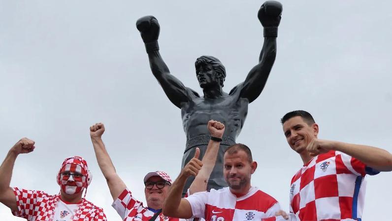 Fans of Croatia gather in front of the Rocky statue in Philadelphia before their World Cup game against Ghana.
