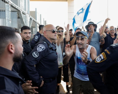 Protesters outside Sde Teiman military base near Beersheba show support for Israeli soldiers accused of sexually abusing Palestinian detainees, 29 July 2024.