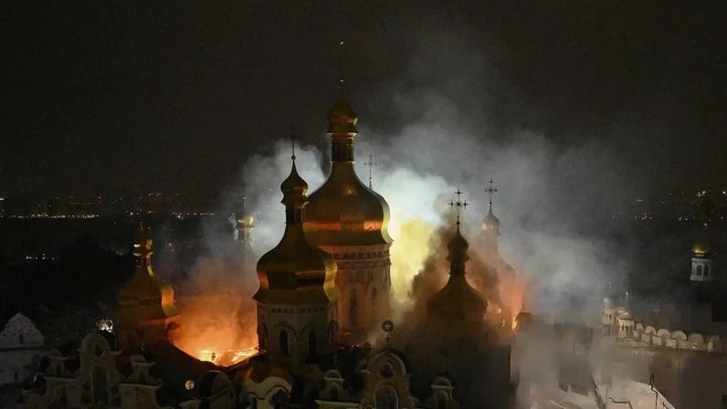 Smoke and fire rises from the Dormition Cathedral in the Orthodox complex of the Kyiv Pechersk Lavra following a Russian missile strike on the Ukrainian capital.