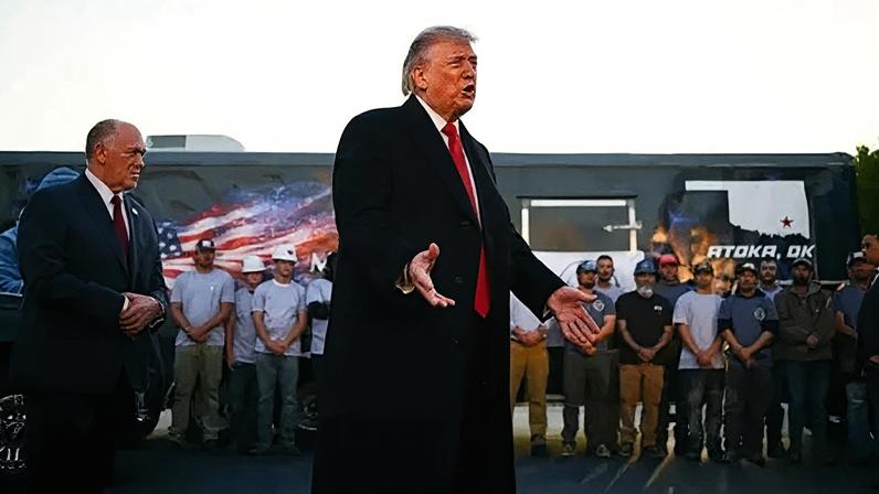 Donald Trump speaking to workers at the Lincoln Memorial Reflecting Pool, which is undergoing renovations ahead of celebrations for America's 250th birthday