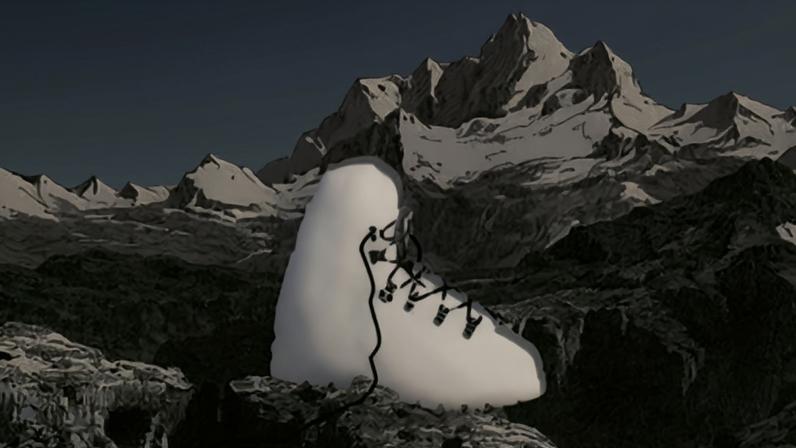 A single Koflach boot against an illustration of Everest.