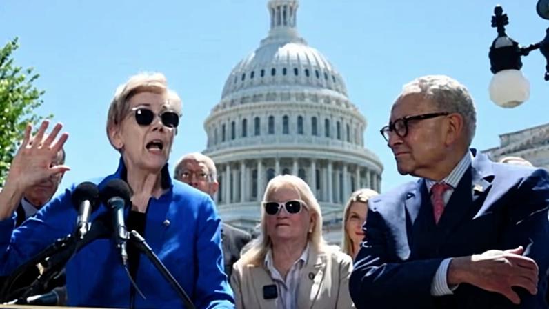 Elizabeth Warren alongside Chuck Schumer at the US Capitol on Wednesday.
