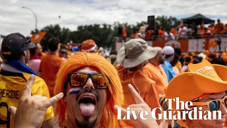 Dutch supporters arrive at Dallas Stadium before the World Cup game against Japan.