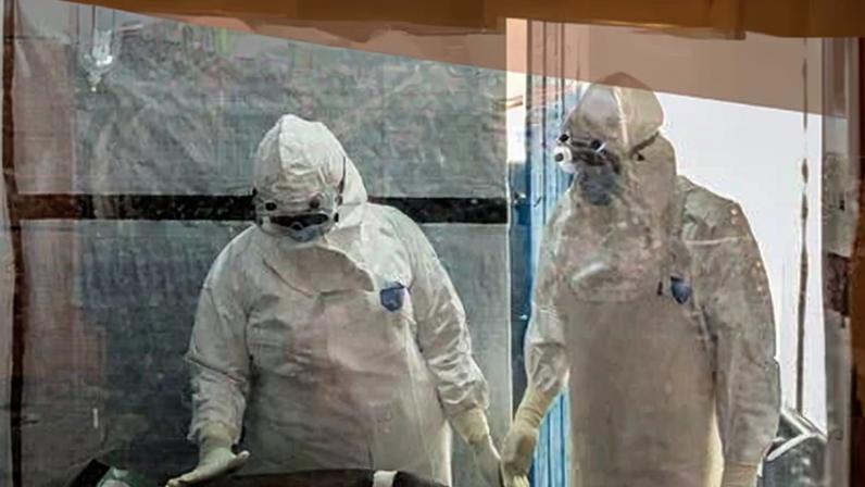 Health workers tend to an Ebola patient in the DRC province of Ituri. The doctor in the French case had been on humanitarian mission in the area.