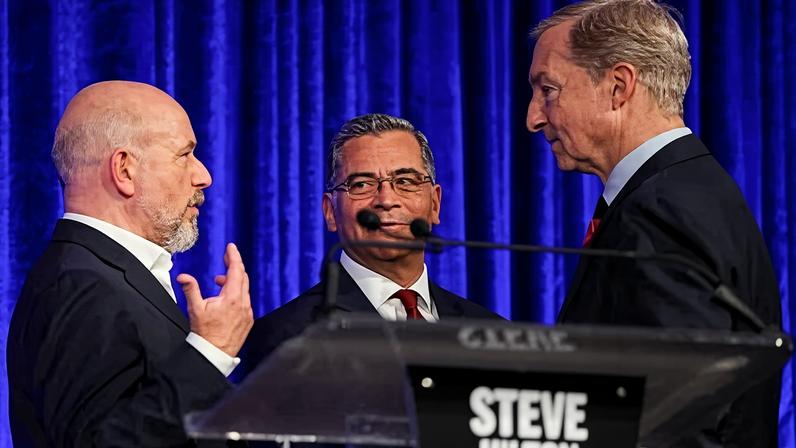 Candidates Steve Hilton, Xavier Becerra and Tom Steyer talk at the end of a debate in the race for governor of California, hosted by the San Francisco Examiner and CBS, in San Francisco, California, on 14 May 2026.